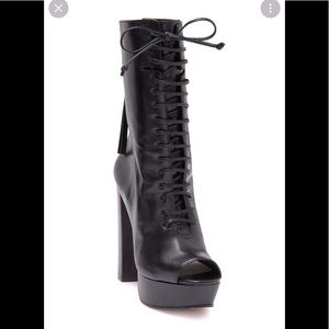 Schutz Tamara open toe lace boots.